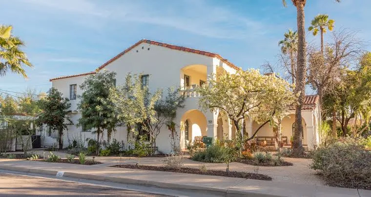 Two-story white stucco residence with arches and a tile roof in the Encanto–Palmcroft photo collection