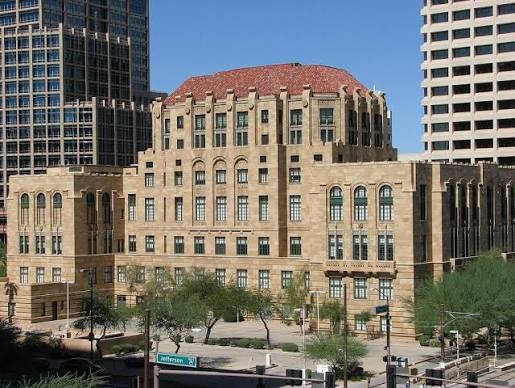 Contemporary view of an older downtown Phoenix civic building among newer high-rises