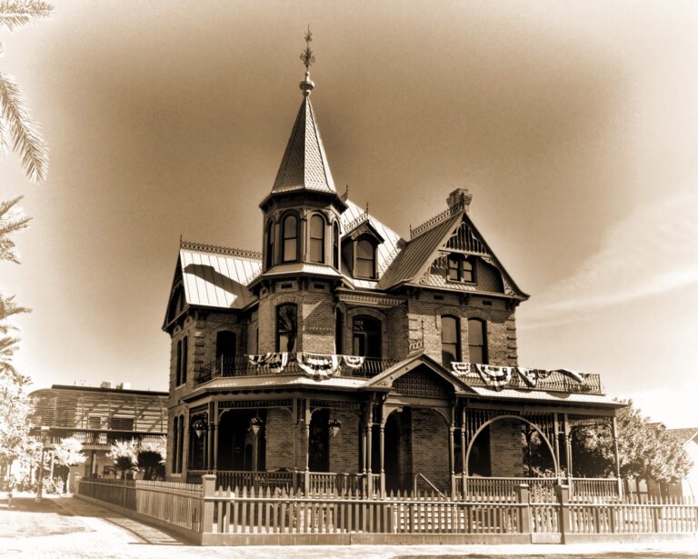 Archival photograph of the Rosson House with its tower and wraparound porch